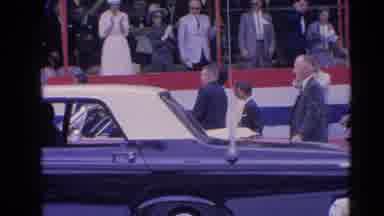 Harvard Illinois USA (1964): A Couple Of Man And Women Lead The Charge Of A Parade