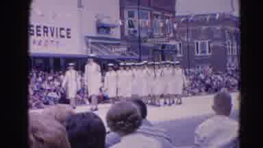 Harvard Illinois USA (1964): A Parade With Crowds Lining Street And Women In White
