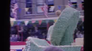 Harvard Illinois USA (1964): A Group Of People Were Going Parade In The Road With