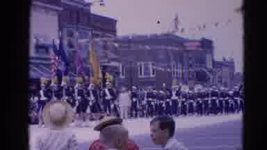 Harvard Illinois USA (1964): Spectators Watch Street Parade Of Marching Band And