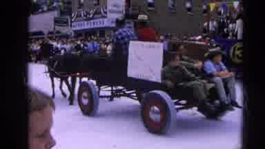 Harvard Illinois USA (1964): Guys Pushing Things Like A Horse And Legs On A Cart