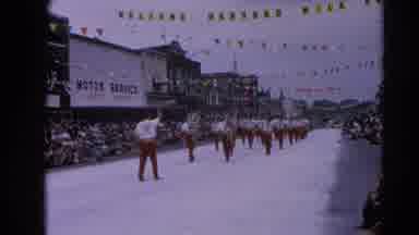 Harvard Illinois USA (1964): Band Marching Along Parade Route And Playing