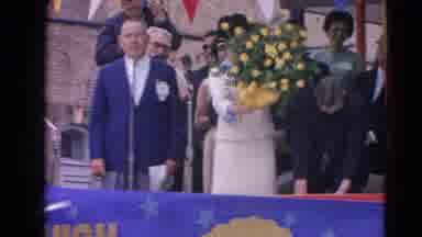 Harvard Illinois USA (1964): Man Standing With Women Winning Flowers