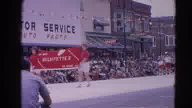 Harvard Illinois USA (1964): Women Marching Down Street And Carrying A Banner In