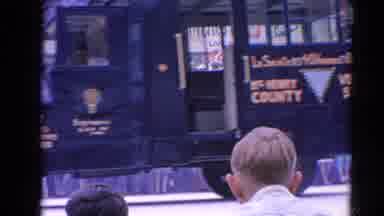 Harvard Illinois USA (1964): Parade Made Of Majorettes And A Band Walking A Street