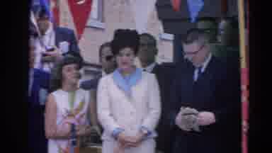 Harvard Illinois USA (1964): Woman Standing In A Platform Laying Down To Talk With