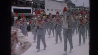 Harvard Illinois USA (1964): Band Parade In The Streed With Majorettes Dressed In