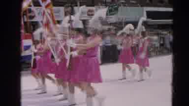 Harvard Illinois USA (1964): Women In Pink Marching Down The Street In A Parade