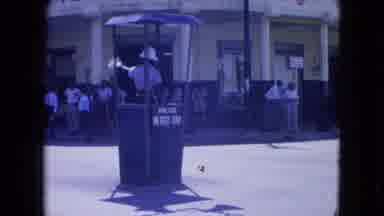 Kingston Jamaica (1964): A Traffic Man Guide Their Direction