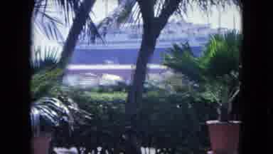 KINGSTON JAMAICA-1964: Windy Weather In Coastal Town With Cruise Ship