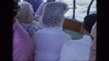 Martenique-1964: People Ride On A Crowded Ferry Boat Across The Water