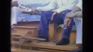 Martenique-1964: Men Relaxing On Boat With Cigarette And Ball