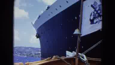 Martenique (1964): Boat Out On The Water With A Pirate Flag And Smaller Boat