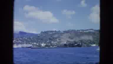 Martenique-1964: Scenic Footage Of A Body Of Water And Land Filmed From A Boat