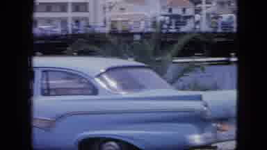 Nassau Bahamas (1964): The Cars Are Standing In The Road Near The Water And Some