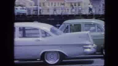 Nassau Bahamas (1964): Numerous Older Cars Seen Parked A Woman Greets A Man More