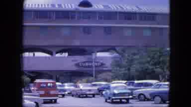 Nassau Bahamas (1964): Shots Of A Parking Lot Outside Of A Large Arched Building