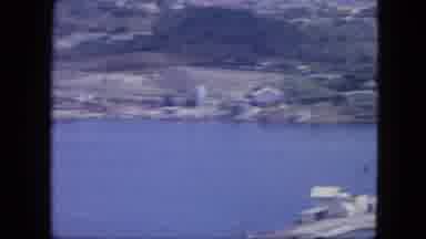 Nassau Bahamas (1964): View Of White Buildings And Ocean On A Clear Sunny Day