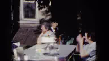 Niagra Falls New York (1964): People Sitting And Talking At White Table With White