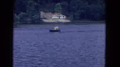 Niagra Falls New York (1964): Two People In A Small Canoe Rowing In A Large Body