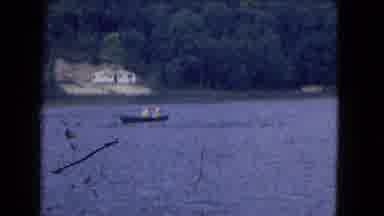Niagra Falls New York (1964): Two People In Yellow Ponchos Canoeing In A Circle In