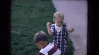 Niagra Falls New York (1964): Boy Plays In The Rocks As Baby Brother Grabs Bunches