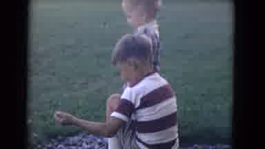 Niagra Falls New York (1964): Two Young White Boys Playing In Rocks On A Lawn