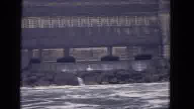 Niagra Falls US (1964): Large Abandoned Building Along A Riverbank Situated In The