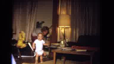 Niagra Falls USA (1964): Baby Stands In Living Room While Mother Cleans Up Cuts To