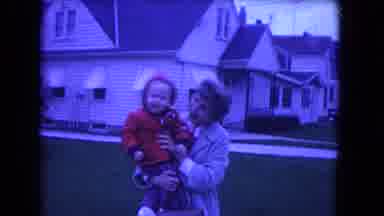 Niagra Falls USA (1964): There's A Lady Holding A Baby In Front Yard On A Snowy