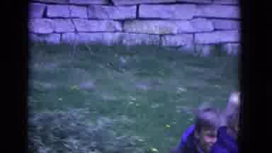 Niagra Falls USA (1964): Two Children Horse Playing Running Near Vintage Cars In