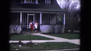 Niagra Falls USA (1964): Two Young Women Walking From A House One Holding A Child