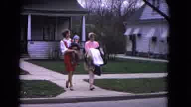 Niagra Falls USA (1964): Two Women Walking Across The Street While Carrying