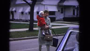 Niagra Falls USA (1964): Man Leaving House Woman And Child Approaching Car Child