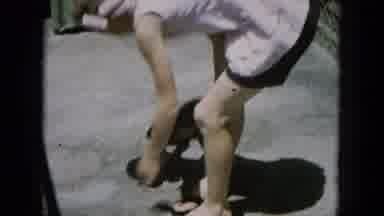 Oahi Hawaii (1964): Puppy Licks Girl's Face Then She Hands The Puppy To Another