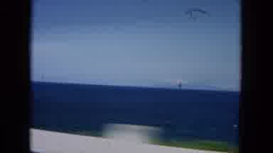 Oahi Hawaii (1964): Family Driving Past Mountain Cliffs And Ocean In 1960'S Sedan
