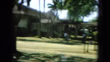 Oahi Hawaii (1964): People Are In The Garden Standing Outside Of The Building