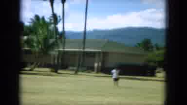 Oahi Hawaii (1964): People Gathered Man Running In Field Of Grass Near Houses Palm