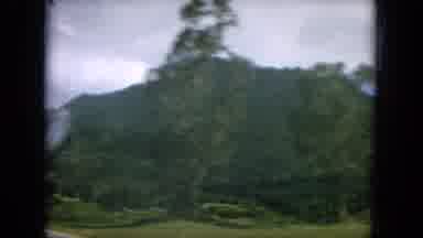 Oahi Hawaii (1964): Green Mountains Passing By In The Countryside From The