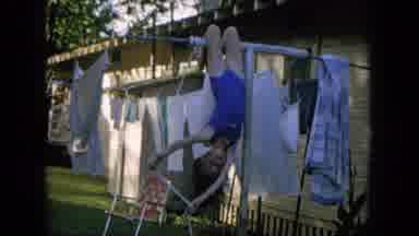 Oahi Hawaii (1964): Child Swings Upside Down On Washing Line Pole While Her