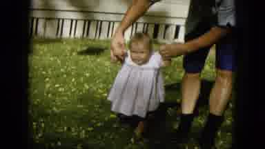 Oahi Hawaii (1964): Baby Plays In Walker And Parents Hold Her Hands And Help Learn