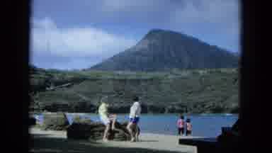 Oahi Hawaii (1964): Old Fashion Camera Recording Couple Looking At A Mountain And