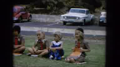 Oahi Hawaii (1964): A Group Of Girl Scouts Sit On The Grass And Listen As They Are