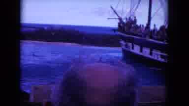 Oahi Hawaii (1964): Dolphins Jump Out Of Water Simultaneously As People Aboard