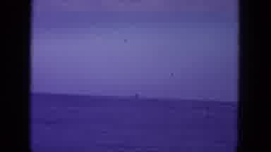 Oahi Hawaii (1964): Two Men Talk On Boat In Open Water On A Clear Day