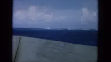 Oahi Hawaii (1964): Ship Deck Blue Water Waves Shoreline Cloudy Sky Boat Rocking