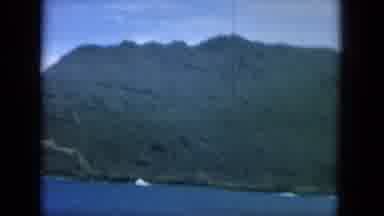 Oahi Hawaii (1964): Jungle Covered Mountain Over The Ocean Waters