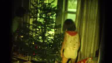 Oahi Hawaii (1964): Young Female Child Looking At Christmas Presents Then Standing
