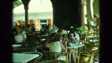 Saint Thomas (1964): Many People Eating In A Restaurant With No Windows And A Lot