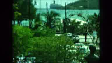 Saint Thomas (1964): Cars Drive By Shore Front Lined With Palm Trees